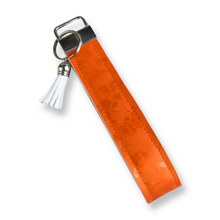 Load image into Gallery viewer, Orange Shimmer Floral Keychain Wristlet